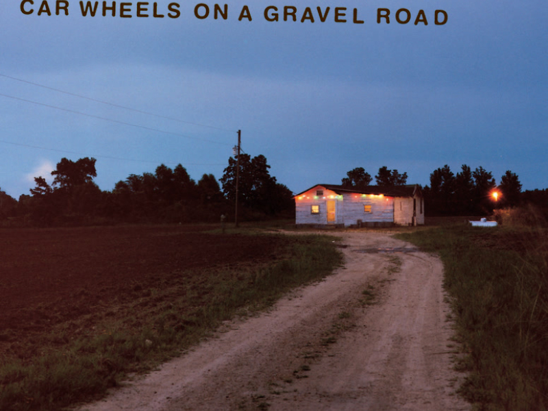 Car Wheels On A Gravel Road