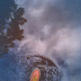 Walking through puddles in the Rain